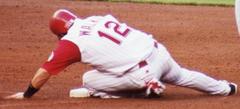 Todd Walker sliding to base during double play against Bret Boone at Cinergy Field