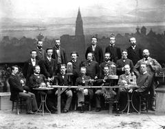 Anton de Bary with students in photo studio overlooking Strasbourg Cathedral before 1888