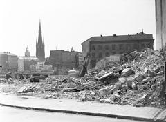 Demolition in Klara district, Stockholm with Konstfackskolan and Klara Church tower in the background, 1957