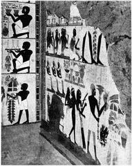 Ancient Egyptian painting inside a royal tomb depicting various figures and hieroglyphs