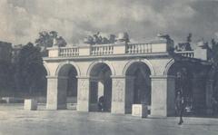 Tomb of the Unknown Soldier monument in Warsaw, Poland with eternal flame and wreaths
