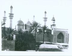 Golestan Palace facade in Tehran with Islamic architecture and Union Jack flag flying