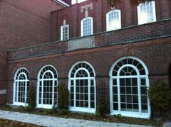 Chapel of Upper Canada College with stained glass windows and wooden pews