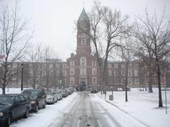 UCC main Upper School building covered in snow on a winter morning
