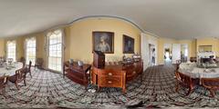 Hamilton Grange National Memorial dining room with long table set for dining, white curtains, portraits of Alexander Hamilton and Elizabeth, and ornate decorations