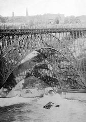 Curtiss Model D biplane flying under Honeymoon Bridge over Niagara River circa 1911