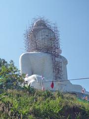 Phuket Big Buddha statue on a clear day with blue sky
