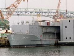 Service craft APL-42 and barracks ship moored behind USS DETROIT AOE-4 at Philadelphia Naval Shipyard in 1993