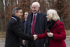 American officials and dignitaries greeting each other during the 80th anniversary ceremony of the Battle of the Bulge at Luxembourg American Cemetery on December 14, 2024