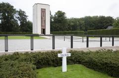 Headstone of U.S. Army Gen. George S. Patton, Jr. at Luxembourg American Cemetery with soldiers from 221st Public Affairs Detachment