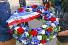 Soldiers from 1ABCT, 1CD displaying wreath at General George S. Patton's gravesite in Luxembourg American Cemetery