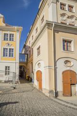 Street view of Bankgäßchen in Löbau with historic buildings and cobblestone road