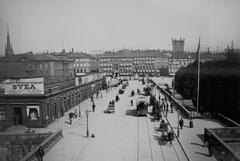 Norrbro bridge from the 1880s with bazaars on the left side, viewed from the Royal Palace