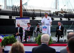 Rear Adm. Gregory M. Nosal speaking at press conference about Star-Spangled Sailabration in Baltimore Inner Harbor