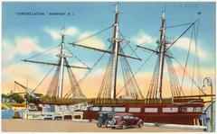 Historic ship Constellation docked in Newport, Rhode Island under a cloudy sky