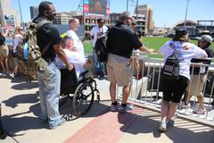 Soldiers and veterans touring the Southwest Stadium in El Paso, Texas