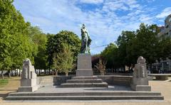 Monument to the Soldier Pigeon in Brussels, bronze statue with a pigeon and soldier figures