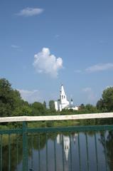 A charming street view of Suzdal, Vladimir Oblast, Russia in July 2016 with traditional Russian wooden houses and greenery