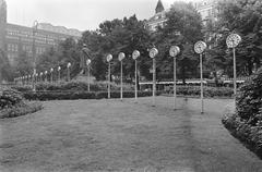 25 clocks art installation by Wim T. Schippers at Rembrandtplein in Amsterdam