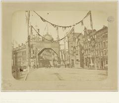 Rembrandtplein decorated for the wedding of King Willem III and Queen Emma in April 1879, view towards the entrance of Reguliersbreestraat with buildings on the right
