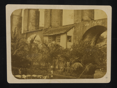 Historic Carioca Aqueduct or Arcos da Lapa in Rio de Janeiro with two levels of stone arches and Santa Tereza tram track