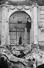 The Great Synagogue in Dukes Place London after 1941 air raid showing Reverend Hermann Mayerowitsch under decorated Ark arch amidst rubble