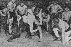 Gymnasium session at Hull House in 1918 with children exercising under supervision