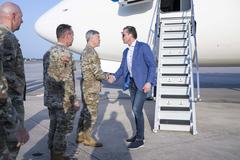 Secretary of Defense Pete Hegseth shaking hands with U.S. Special Operations Command Commander U.S. Army Gen. Bryan Fenton at MacDill Air Force Base