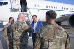 Secretary of Defense Pete Hegseth shaking hands with 6th Air Refueling Wing Commander Col. Ed Szczepanik at MacDill Air Force Base