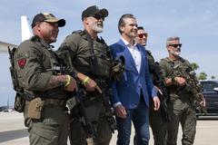 Secretary of Defense Pete Hegseth posing for a photo with Department of Homeland Security forces at MacDill Air Force Base Florida May 6 2025