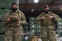 6th Security Forces Squadron female patrolmen wearing improved body armor at MacDill Air Force Base