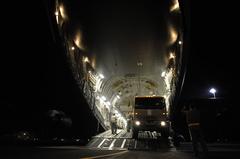 U.S. Air Force Master Sgt. Jeff Wilson marshaling U.S. Army Light Medium Tactical Vehicle onto C-17 Globemaster III at MacDill Air Force Base