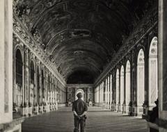 Pvt. Gordon Conrey in the Hall of Mirrors at Versailles after liberation