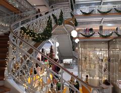 Decorated staircase inside La Samaritaine in Paris