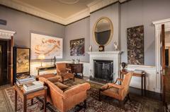 Elegant sitting room interior of Lord Harewood inside Harewood House with classic British decor and ornate furnishings in Leeds, Yorkshire, England