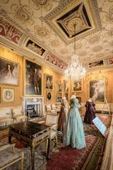 Interior view of the ornate Cinnamon Drawing Room at Harewood House in Yorkshire, England