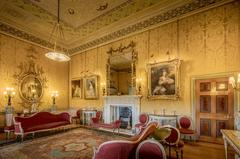 Interior view of the Yellow Drawing Room in Harewood House, featuring ornate yellow walls and elegant architectural details in Leeds, Yorkshire, England