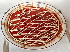 Carpaccio Cipriani with thin slices of raw beef drizzled with mayonnaise at Harry's Bar Venice