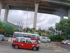 Stonecutters Island Container Port Road South with Stonecutters Bridge and Tsing Sha Highway flyover in Hong Kong, June 2024