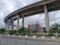 Stonecutters Island Container Port Road South and Stonecutters Bridge with Tsing Sha Highway flyover in Hong Kong in June 2024
