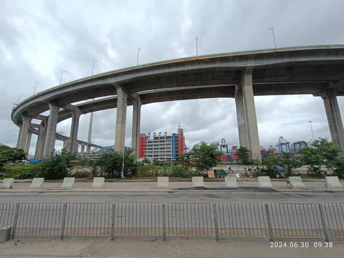 Stonecutters Bridge and Container Port Road South at Stonecutters Island Hong Kong with Tsing Sha Highway flyover in June 2024