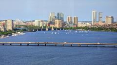 Harvard Bridge with sailboats on the Charles River between Boston and Cambridge Massachusetts