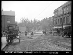 Excavation at Harvard Square for temporary 36-inch water main to facilitate subway construction, May 18, 1910
