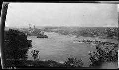 View over Ottawa River towards Hull, Quebec with lumber and paper mill in the background