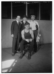 Luis Firpo with G. Widmer, A. Mayer, and J. DeForest in a group photo