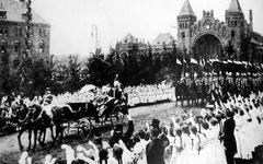 Kaiserparade in Altona showing the Kaiser leading a formation with fir trees in the background hiding Stuhlmannbrunnen construction site