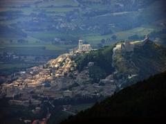 View of Assisi city from Monte Subasio with historic buildings and hills