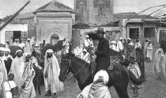 Émile Mauchamp on horseback in front of the Kutubiya mosque in Marrakesh
