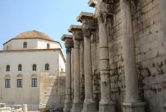 Tsidarakis Mosque and ruins of Hadrian's Library in Athens Greece