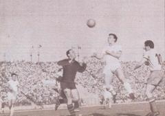 Romania vs East Germany football match 3-2 at Stadionul 23 August with Gabriel Raksi in the opponent's penalty area and Harald Fritzsche goalkeeper